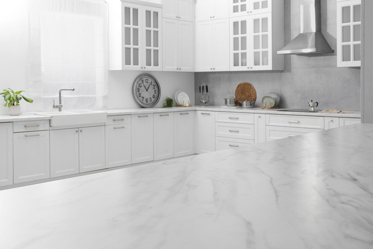 Stylish white marble countertop in kitchen