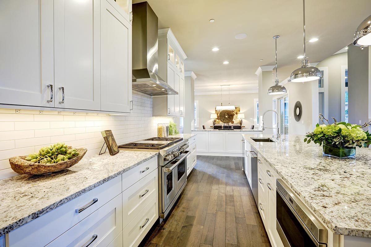 Kitchen remodel with white granite countertops